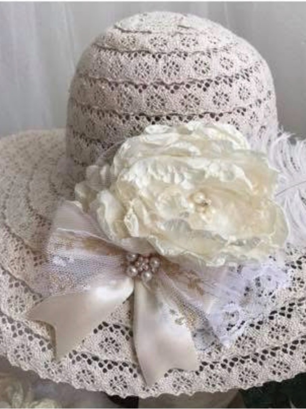 Women's Crochet Sun Hat with Ivory Floral Accent flower hands made from designer